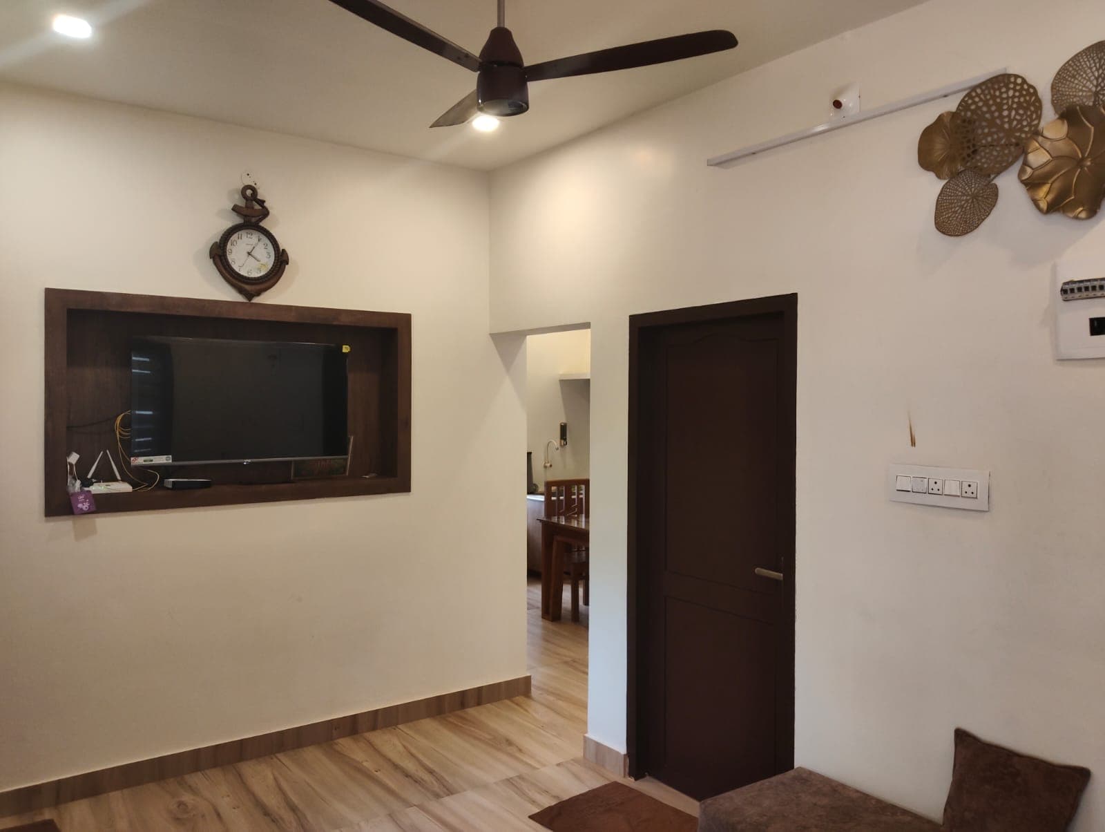 Lower Ground Living Hall with recessed TV niche and warm ambient glow