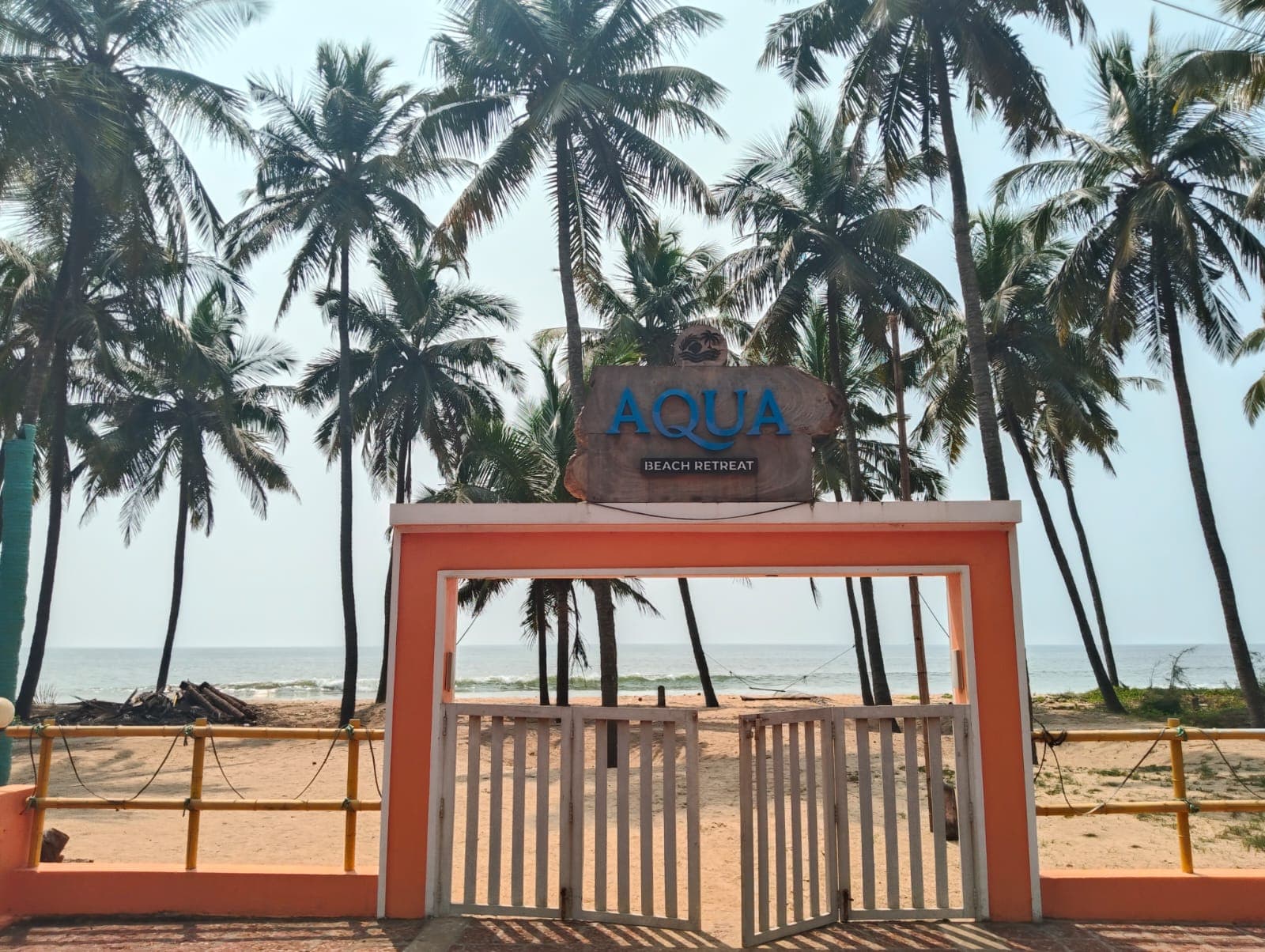 Kastay Beach private entrance gate opening directly onto the Arabian Sea sands